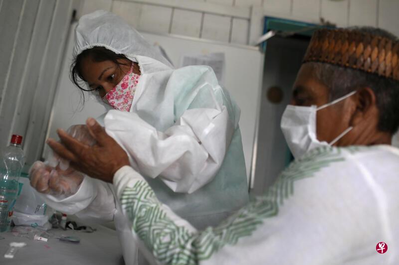 截至21日,巴西冠病确诊人数达31万,死亡人数已超过2万。(法新社) 截至21日,巴西冠病确诊人数达31万,死亡人数已超过2万。(法新社)