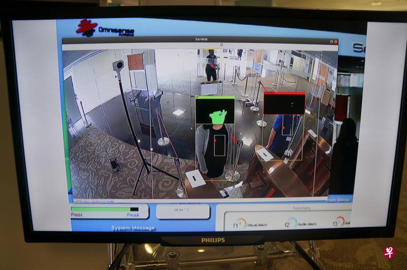 政府科技局研发新的智能闸门系统“VigilantGantry”,通过人工智能技术查看访客是否有足够外露的皮肤可进行准确的测温,即便公众戴着口罩、帽子或头巾等,系统也能自动检测体温和打开闸门。(政府科技局提供) 政府科技局研发新的智能闸门系统“VigilantGantry”,通过人工智能技术查看访客是否有足够外露的皮肤可进行准确的测温,即便公众戴着口罩、帽子或头巾等,系统也能自动检测体温和打开闸门。(政府科技局提供)