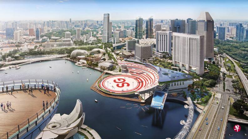 由滨海湾浮动舞台重新发展的“卫国广场”(NS Square)初步设计曝光,原本标志性的方形浮台,将变身成巨型圆形舞台,并漆上象征新加坡的“SG”英文字样,成为我国市中心闪亮的小红点。(国防部、国家发展部和WOHA建筑事务所提供) 由滨海湾浮动舞台重新发展的“卫国广场”(NS Square)初步设计曝光,原本标志性的方形浮台,将变身成巨型圆形舞台,并漆上象征新加坡的“SG”英文字样,成为我国市中心闪亮的小红点。(国防部、国家发展部和WOHA建筑事务所提供)