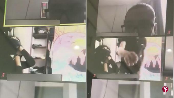 由Zoom的视像会议软件可见,女生遭匪徒綑绑双手,劫匪(右)察觉不对劲,伸手压低电脑摄像镜头。(互联网) 由Zoom的视像会议软件可见,女生遭匪徒綑绑双手,劫匪(右)察觉不对劲,伸手压低电脑摄像镜头。(互联网)