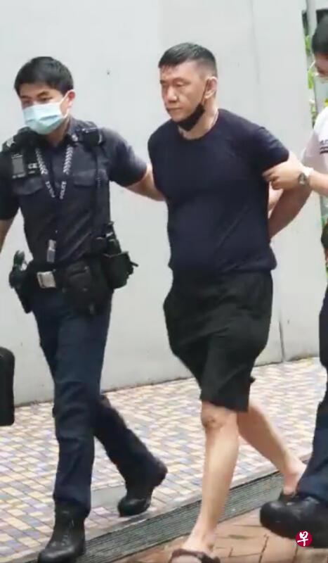 壮汉被捕后,今日在谋杀罪名被控上庭。(档案照) 壮汉被捕后,今日在谋杀罪名被控上庭。(档案照)