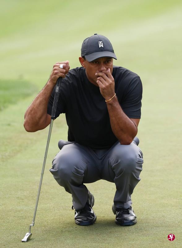 伍兹昨天在ZoZo锦标赛首日比赛中出师不利,以高于标准杆4杆的76杆,排名第75位。(法新社) 伍兹昨天在ZoZo锦标赛首日比赛中出师不利,以高于标准杆4杆的76杆,排名第75位。(法新社)