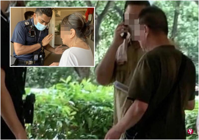 警员在楼下向屋主何先生（右）了解情况。
