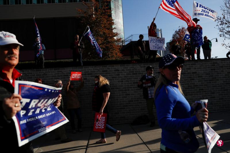 密歇根州的特朗普支持者。(路透社) 密歇根州的特朗普支持者。(路透社)