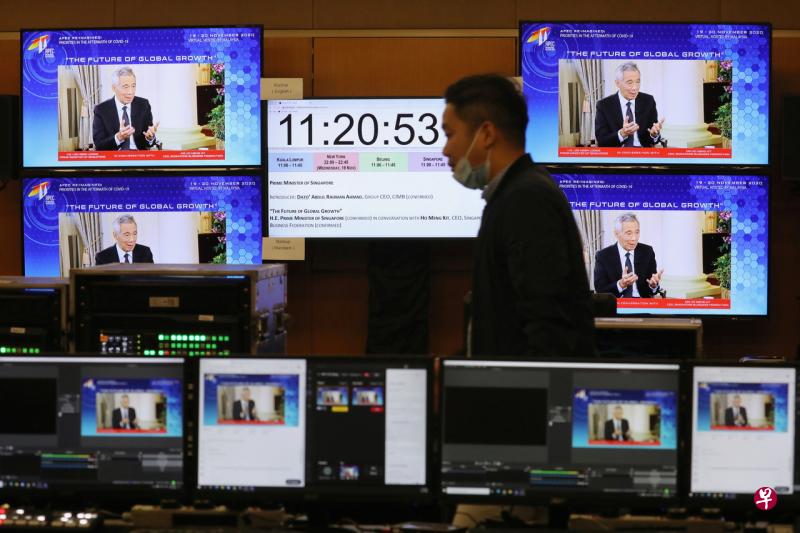 李显龙总理在亚太经济合作组织总裁峰会对话会的预录视频中表示,即使克服了冠病这个公共卫生危机,旅游与全球的跨境经济活动长期都不会恢复到正常状态,或许要大约两年时间才会接近正常。(路透社) 李显龙总理在亚太经济合作组织总裁峰会对话会的预录视频中表示,即使克服了冠病这个公共卫生危机,旅游与全球的跨境经济活动长期都不会恢复到正常状态,或许要大约两年时间才会接近正常。(路透社)