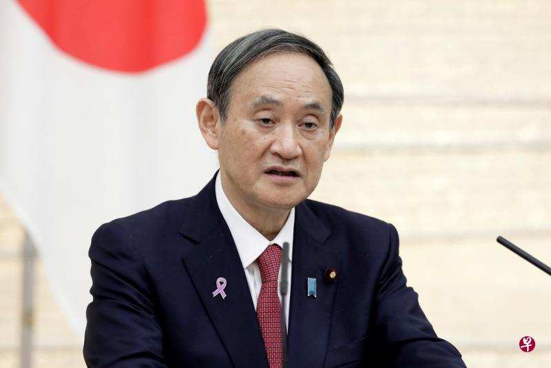 菅义伟说在餐会上跟旁人有保持足够的社交距离。(路透社档案照片) 菅义伟说在餐会上跟旁人有保持足够的社交距离。(路透社档案照片)