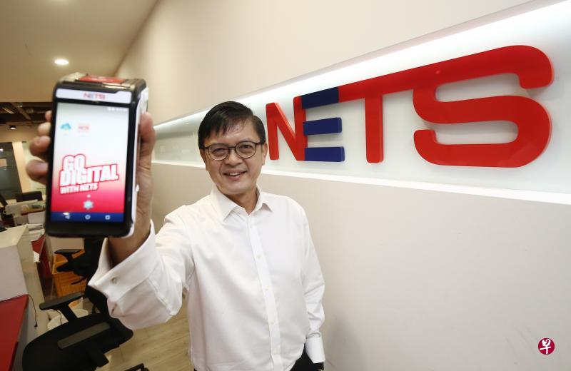 NETS集团首席执行官陈明耀认为,疫情给数码付款领域带来正面改变,人们对无现金模式的接纳度比以往更高。(陈渊庄摄) NETS集团首席执行官陈明耀认为,疫情给数码付款领域带来正面改变,人们对无现金模式的接纳度比以往更高。(陈渊庄摄)