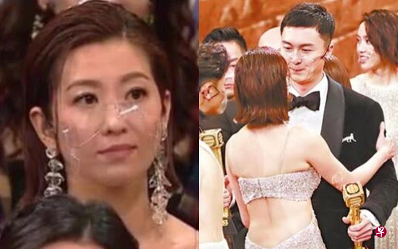 老公获视帝台上发言感谢,镜头捕捉到陈自瑶木无表情(左图),不过之后她主动与老公拥抱。(互联网) 老公获视帝台上发言感谢,镜头捕捉到陈自瑶木无表情(左图),不过之后她主动与老公拥抱。(互联网)
