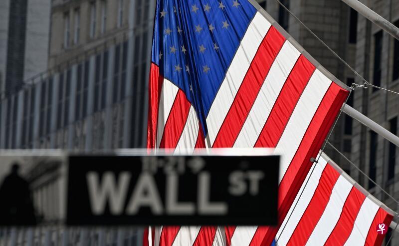 华尔街股市周五(19日)收盘基本持平。(法新社) 华尔街股市周五(19日)收盘基本持平。(法新社)