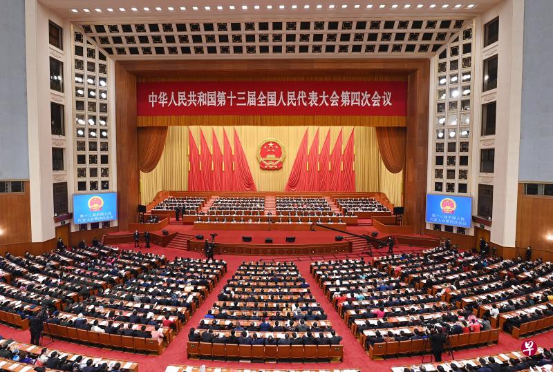 3月11日,第十三届全国人民代表大会第四次会议在北京人民大会堂举行闭幕会。(新华社) 3月11日,第十三届全国人民代表大会第四次会议在北京人民大会堂举行闭幕会。(新华社)