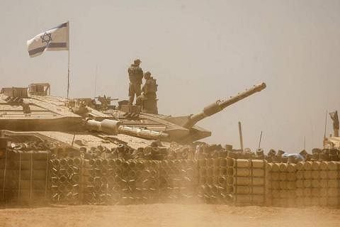 以色列军队5月7日进入加沙地带南部城市拉法东区，声称正在打击当地的武装分子。（路透社）